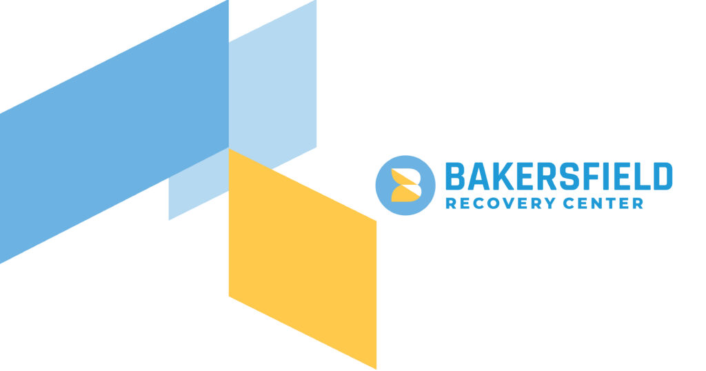 Bakersfield Recovery Center logo featuring blue and yellow geometric shapes with a round blue emblem and the bold blue wordmark 'BAKERSFIELD RECOVERY CENTER' on white.