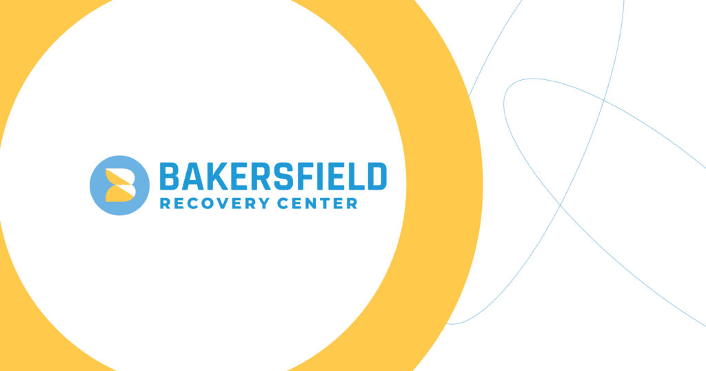 Bakersfield Recovery Center logo: blue circular icon with yellow shape and bold blue text on white background with yellow arcs on edge.